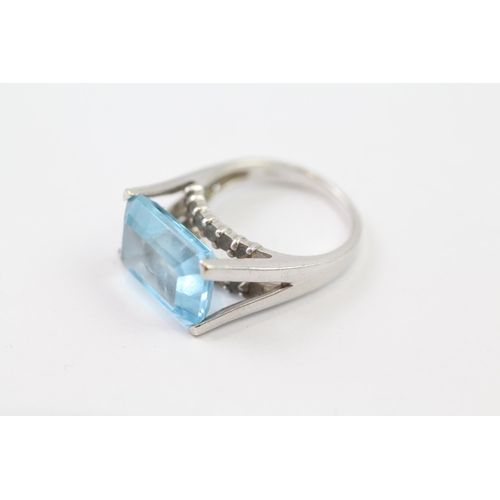 137 - 9ct White Gold Blue Topaz Cocktail Ring (6.1g) Size  M