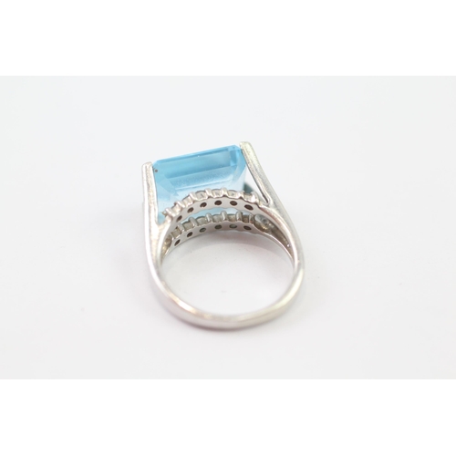 137 - 9ct White Gold Blue Topaz Cocktail Ring (6.1g) Size  M