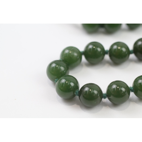 149 - 14ct Gold Clasped Vintage Individually Knotted Nephrite Necklace (75g)