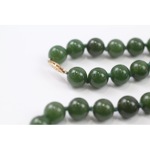 149 - 14ct Gold Clasped Vintage Individually Knotted Nephrite Necklace (75g)