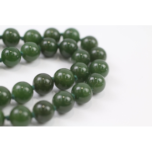 149 - 14ct Gold Clasped Vintage Individually Knotted Nephrite Necklace (75g)