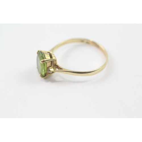 158 - 14ct gold peridot single stone ring (2.1g) Size  R