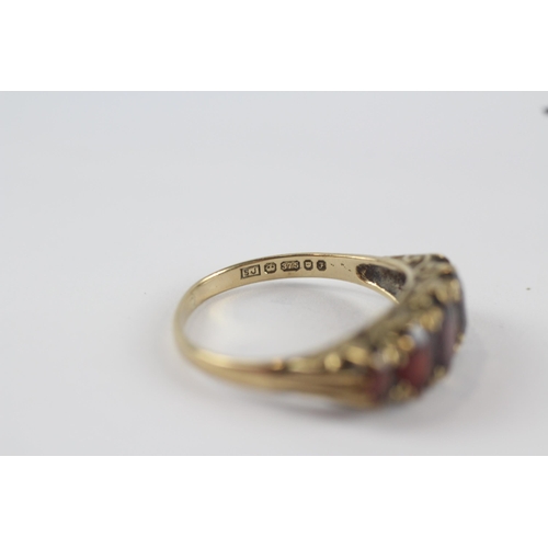 173 - 9ct gold garnet five stone ring (2.7g) Size  O