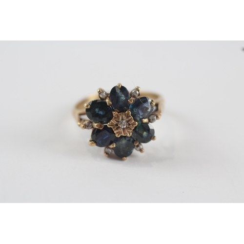 204 - 9ct gold vintage diamond & teal sapphire floral dress ring (3.8g) Size  O