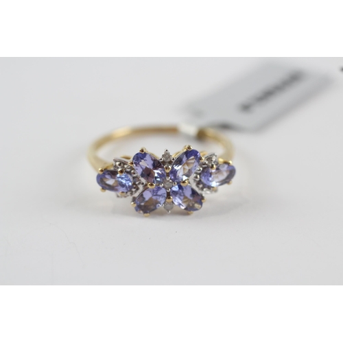 206 - 9ct gold tanzanite & diamond floral dress ring (2.4g) Size  P 1/2