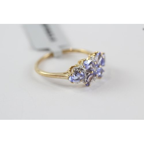 206 - 9ct gold tanzanite & diamond floral dress ring (2.4g) Size  P 1/2