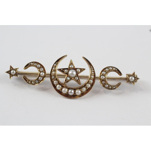 211 - 14ct gold antique split pearl crescent moon & starburst brooch (3.3g)