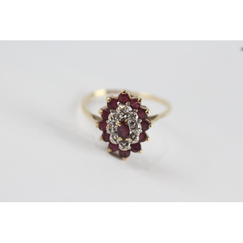 214 - 9ct gold ruby & diamond marquise cluster ring (2.3g) Size  R