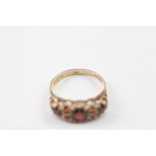 233 - 9ct gold vintage garnet set dress ring (2.1g) Size  N