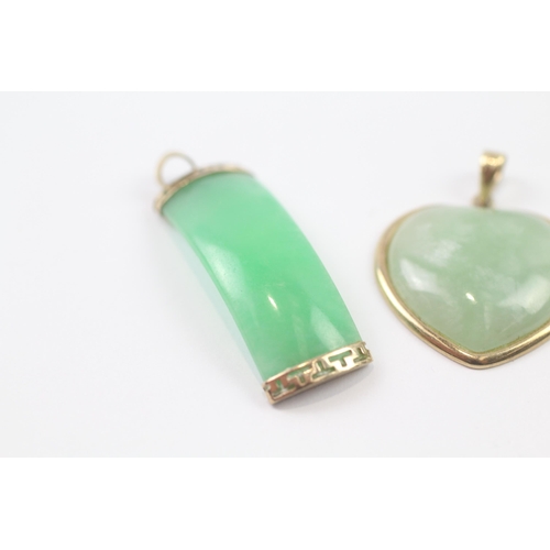 250 - 3 x 9ct gold green jade, purple jade and diamond, and dyed green jade pendants (9.7g)