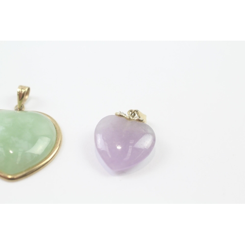 250 - 3 x 9ct gold green jade, purple jade and diamond, and dyed green jade pendants (9.7g)