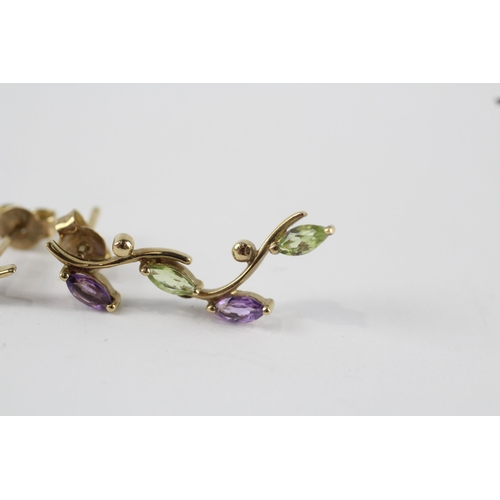 257 - 9ct gold peridot & amethyst foliate paired drop earrings (2.1g)