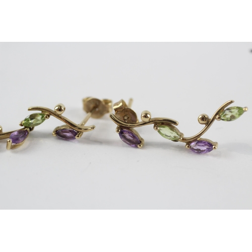 257 - 9ct gold peridot & amethyst foliate paired drop earrings (2.1g)