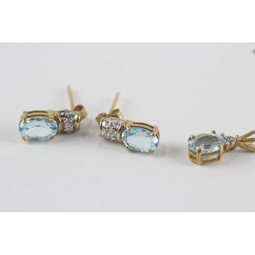 274 - 9ct gold blue topaz & clear gemstone pendant & stud earrings set (2g)