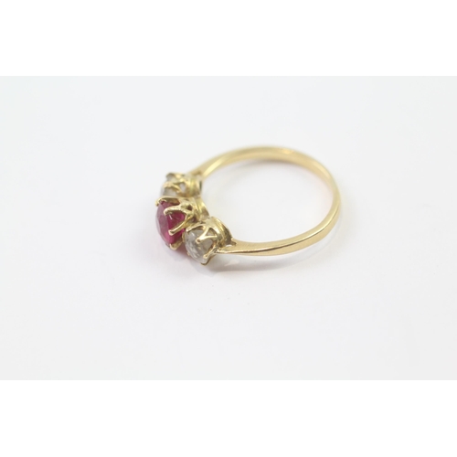 276 - 18ct gold synthetic ruby & white gemstone three stone ring (2.8g)