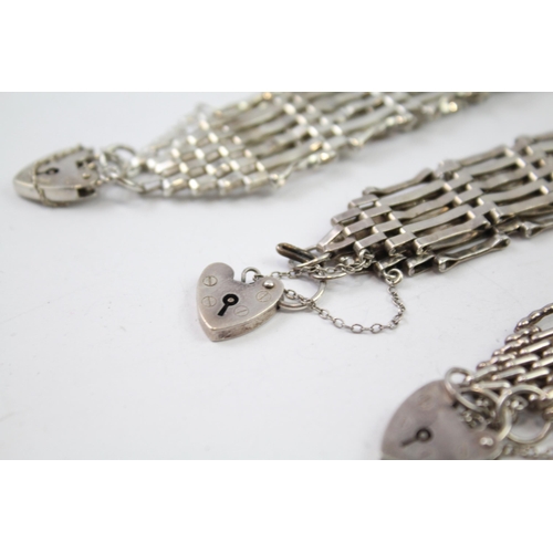 294 - Three silver gate bracelets with heart padlock clasps (58g)