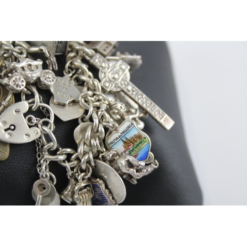 295 - Silver charm bracelet with heart padlock clasp (105g)