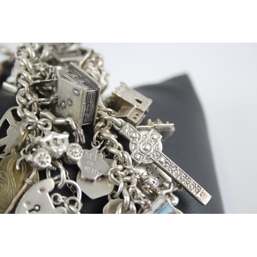 295 - Silver charm bracelet with heart padlock clasp (105g)