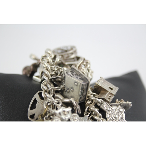 295 - Silver charm bracelet with heart padlock clasp (105g)