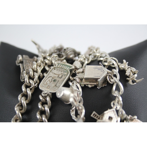 296 - Two silver charm bracelets with heart padlock clasps (85g)