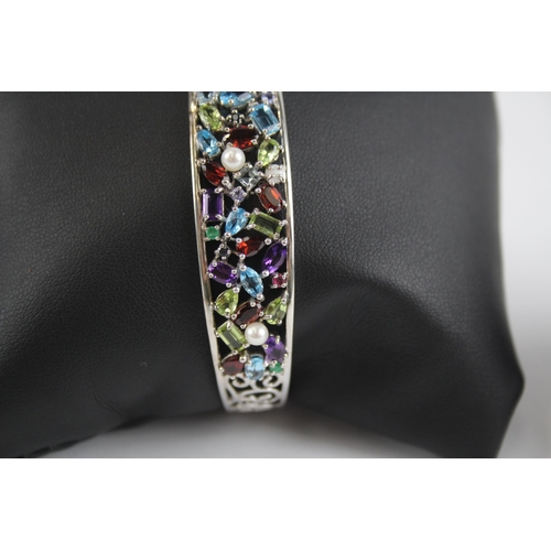 302 - Silver multi gemstone set including bangle and ring (22g)