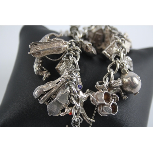 305 - Silver charm bracelet with heart padlock clasp (108g)