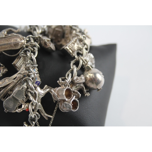 305 - Silver charm bracelet with heart padlock clasp (108g)