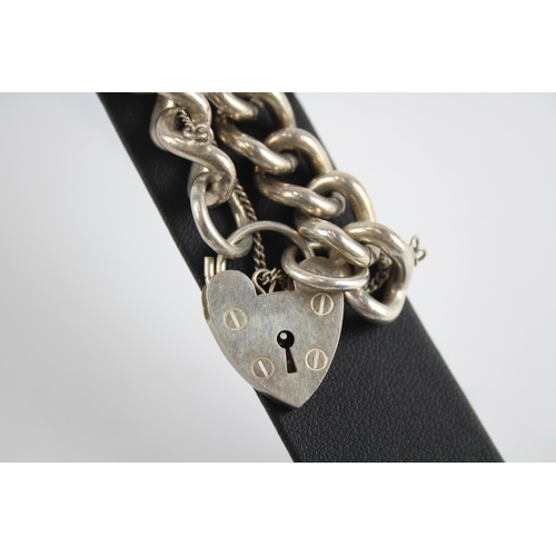 312 - Silver chunky curb link bracelet with heart padlock clasp by ASJ (57g)