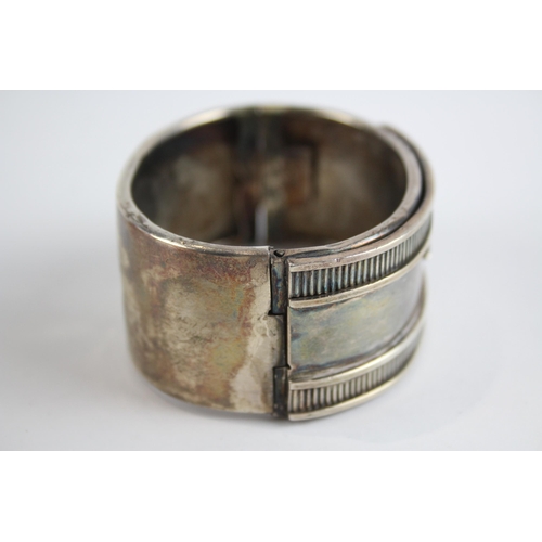 317 - Silver antique buckle design bangle (57g)