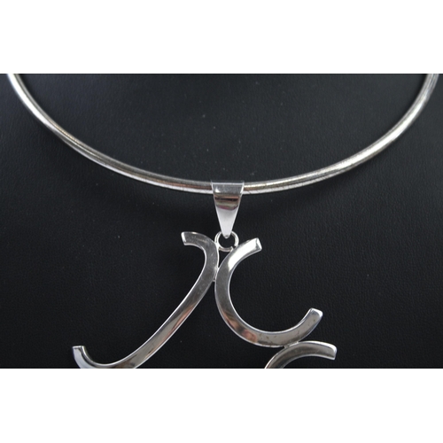 330 - Silver modernist torque necklace with pendant (47g)