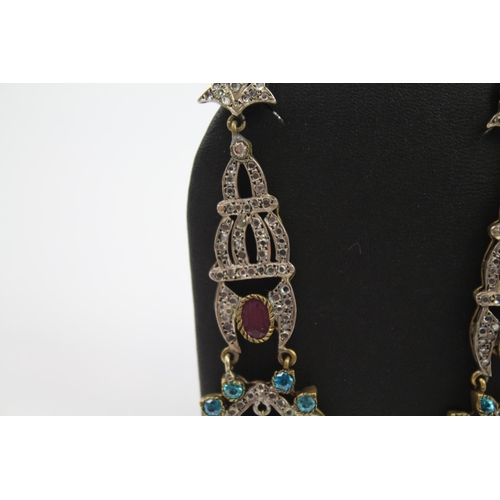 335 - A pair of silver traditional wedding earrings including gemstone (16g)