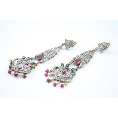 335 - A pair of silver traditional wedding earrings including gemstone (16g)