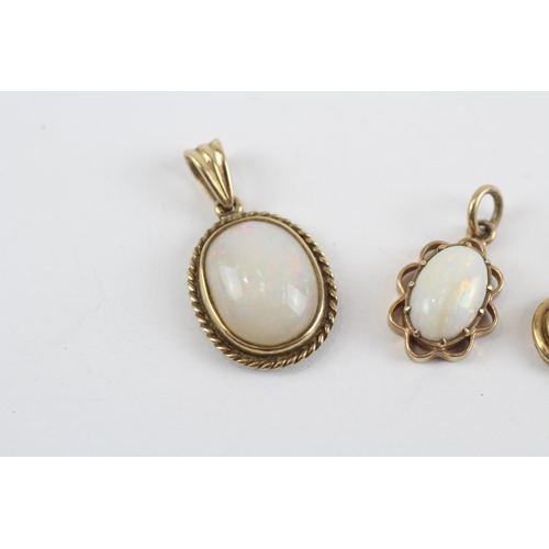 87 - 3 X 9ct Gold White Opal Pendants (4.4g)