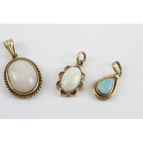 87 - 3 X 9ct Gold White Opal Pendants (4.4g)