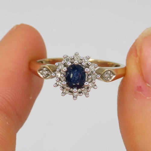 65 - 9ct Gold Diamond & Sapphire Oval Halo Ring (1.9g) Size  M