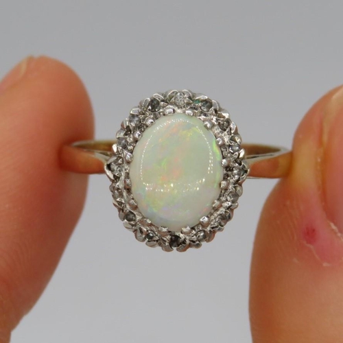 98 - 9ct Gold Diamond & White Opal Oval Halo Ring (3.3g) Size  O 1/2