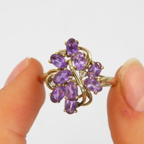 203 - 9ct gold amethyst & diamond floral dress ring (3.1g) Size  S