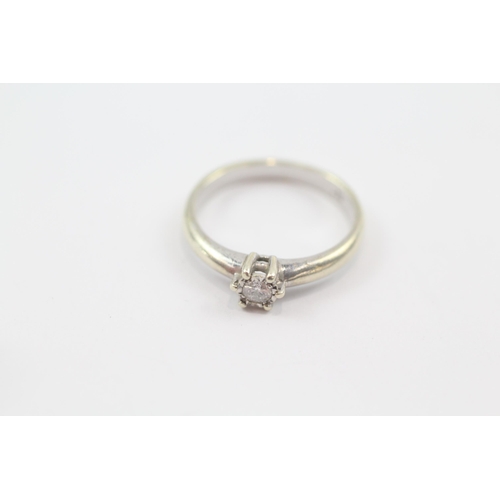 128 - 9ct white gold diamond solitaire ring (2.5g) Size  M