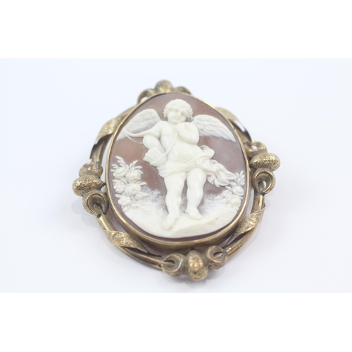 143 - 9ct gold antique shell angel cameo antique brooch (18.5g)
