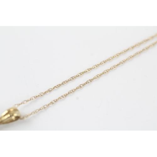 145 - 9ct gold diamond cluster pendant & chain (2.1g)