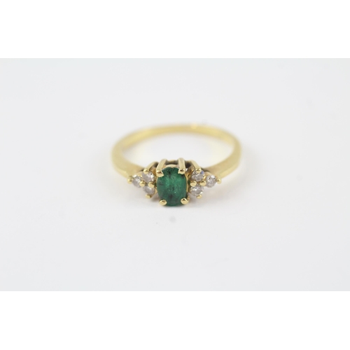 149 - 18ct gold emerald & diamond dress ring (2.4g) Size  K