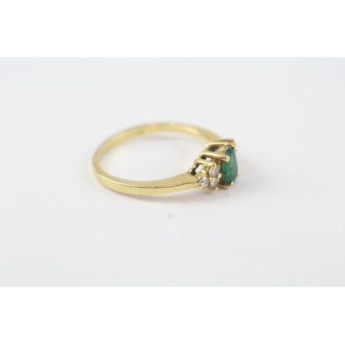 149 - 18ct gold emerald & diamond dress ring (2.4g) Size  K