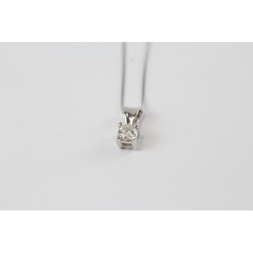 164 - 9ct white gold diamond solitaire pendant necklace (1g)