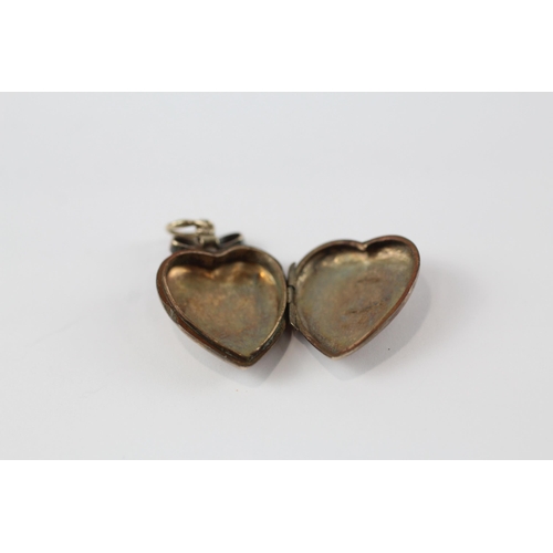 165 - 9ct gold back & front heart antique locket (2.2g)