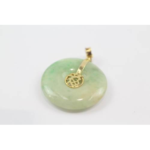 167 - 18ct gold jade pendant (3.5g)