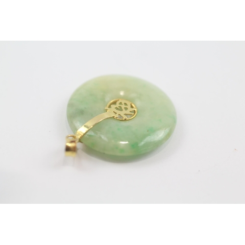 167 - 18ct gold jade pendant (3.5g)