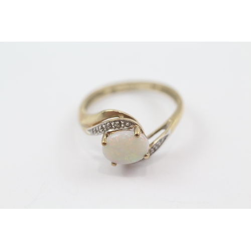 194 - 9ct gold vintage opal & diamond bypass ring (2.5g) Size  Q