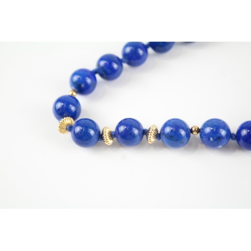 31 - 9ct gold clasp lapis lazuli single strand necklace with gold spacers (45.9g)