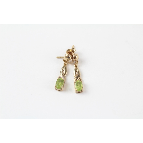 53 - 9ct gold peridot drop paired earrings (1.8g)