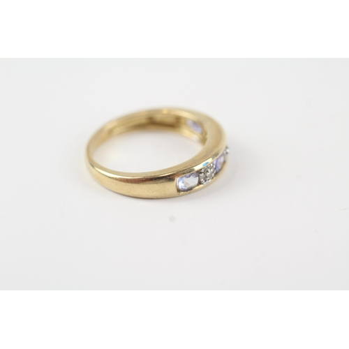 70 - 9ct gold tanzanite & diamond half eternity ring (2.3g) Size  K